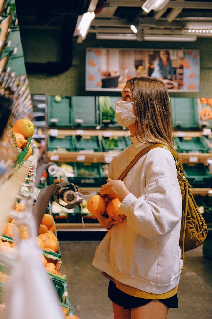 Woman shopping for fresh produce