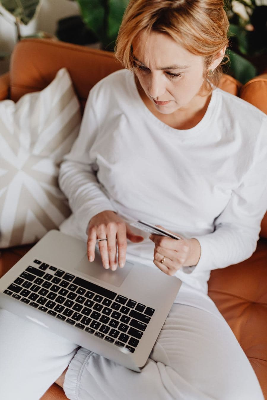 Woman on a laptop on the couch